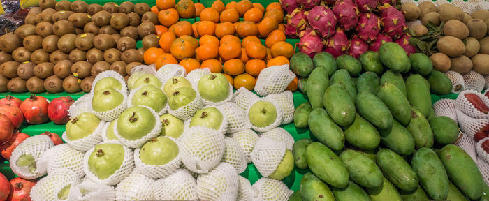 Various fruits for sale at market stall