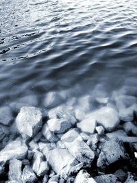 High angle view of waves in sea