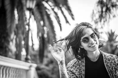 Portrait of smiling young woman outdoors