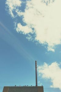 Low angle view of built structure against blue sky