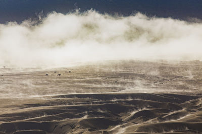 Scenic view of land against sky