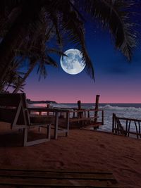 Scenic view of beach against sky during sunset