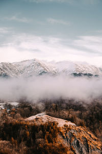 Scenic view of snowcapped mountains against sky