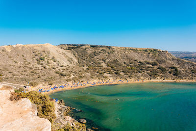 High angle view of beach against clear blue sky