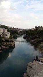 View of river against cloudy sky