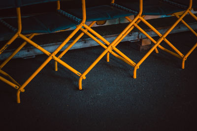 High angle view of chairs on road