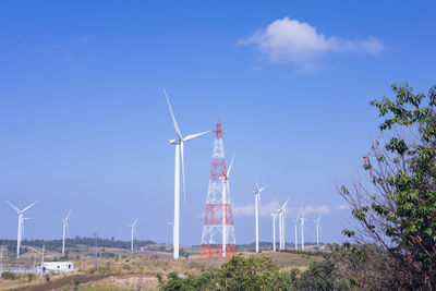 Low angle view of electricity pylon against sky