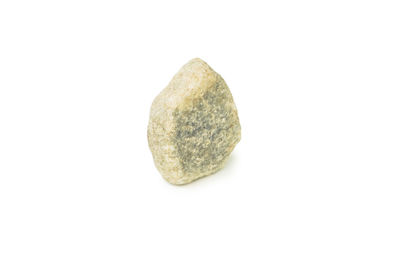 Close-up of a rock against white background