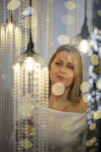 Portrait of young woman having drink