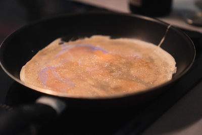 High angle view of meat in cooking pan