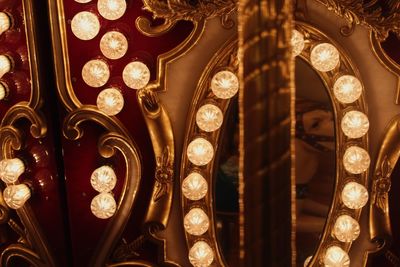 Close-up of illuminated mirror