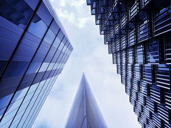 Low angle view of modern buildings against sky