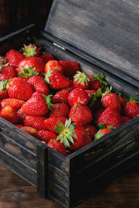 Close-up of strawberries in container on table