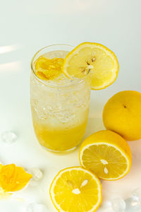 Close-up of yellow drink on table