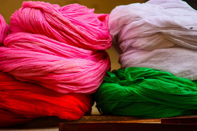 Close-up of multi colored flowers on table