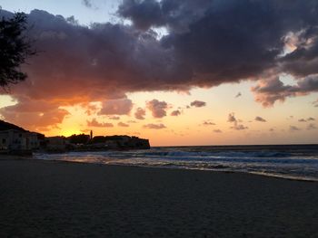 Scenic view of sea against sky during sunset