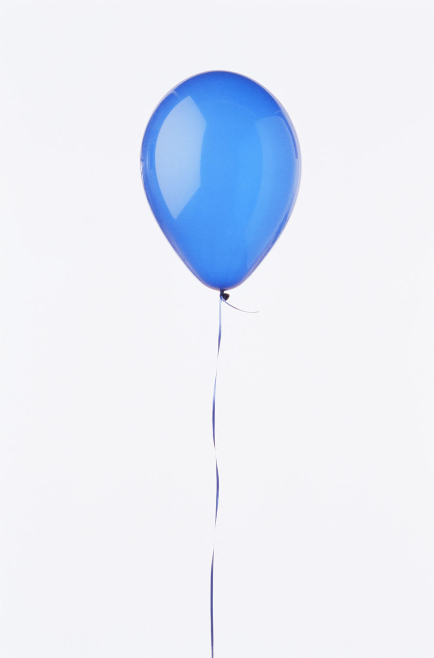 LOW ANGLE VIEW OF BALLOONS AGAINST BLUE BACKGROUND