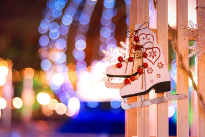 Close-up of illuminated christmas lights at night