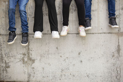 Low section of kids sitting