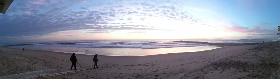 Scenic view of beach during sunset