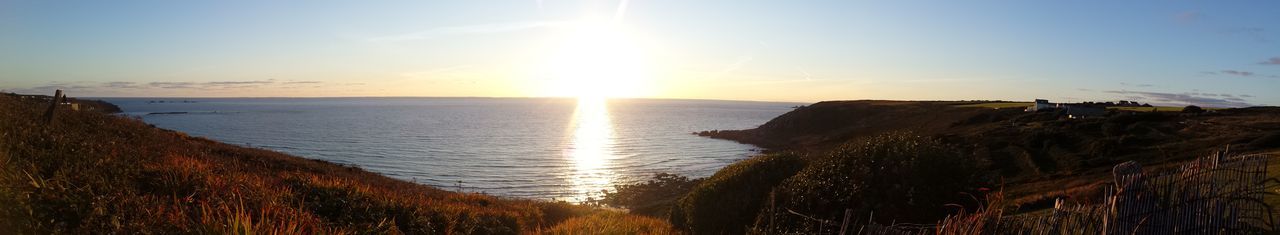 Scenic view of sea at sunset