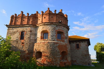 Low angle view of historic building against sky