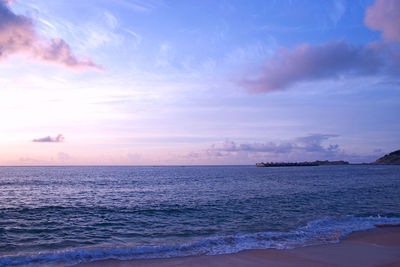 Scenic view of sea at sunset