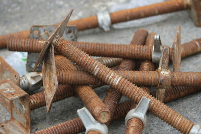 Close-up of rusty metal on wood