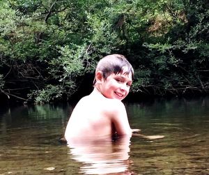 Girl swimming in lake