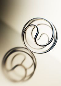 High angle view of wedding rings on table