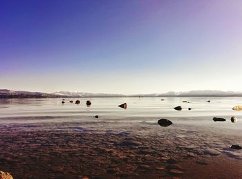 Scenic view of sea against clear sky