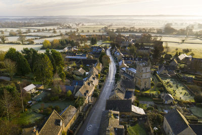 High angle view of road amidst buildings in city