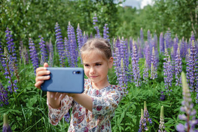 Young woman using mobile phone