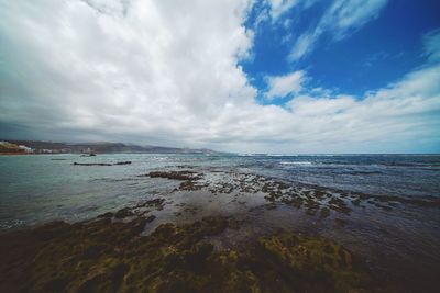 View of sea against cloudy sky