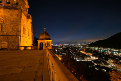 Illuminated historic building against sky at night