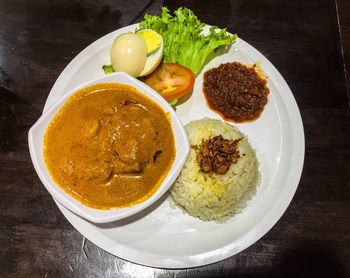 High angle view of meal served on table