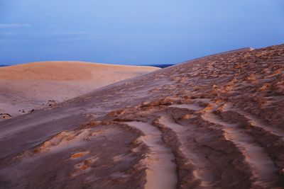 Scenic view of desert against sky