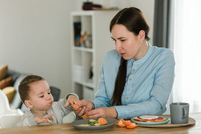 Mother and daughter at home