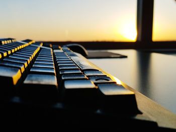 Close-up of piano keys on table