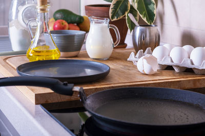 Workplace in the kitchen with ingredients and utensils for baking pancakes. home cooking food, diy