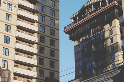 Low angle view of buildings against clear sky