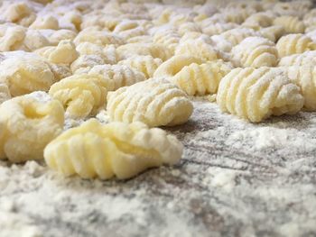 Close-up of raw gnocchi on cutting board