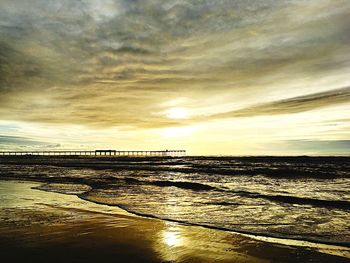 Scenic view of sea against dramatic sky