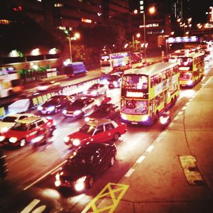 View of traffic on road at night