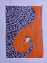 Close-up of a bird on the table