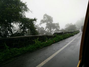 Road passing through field