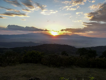 Scenic view of sunset over river