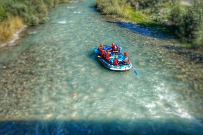 High angle view of people in boat on river