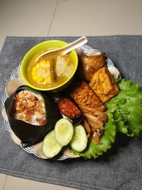 High angle view of fruits in bowl on table