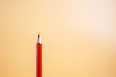 Close-up of colored pencils against white background